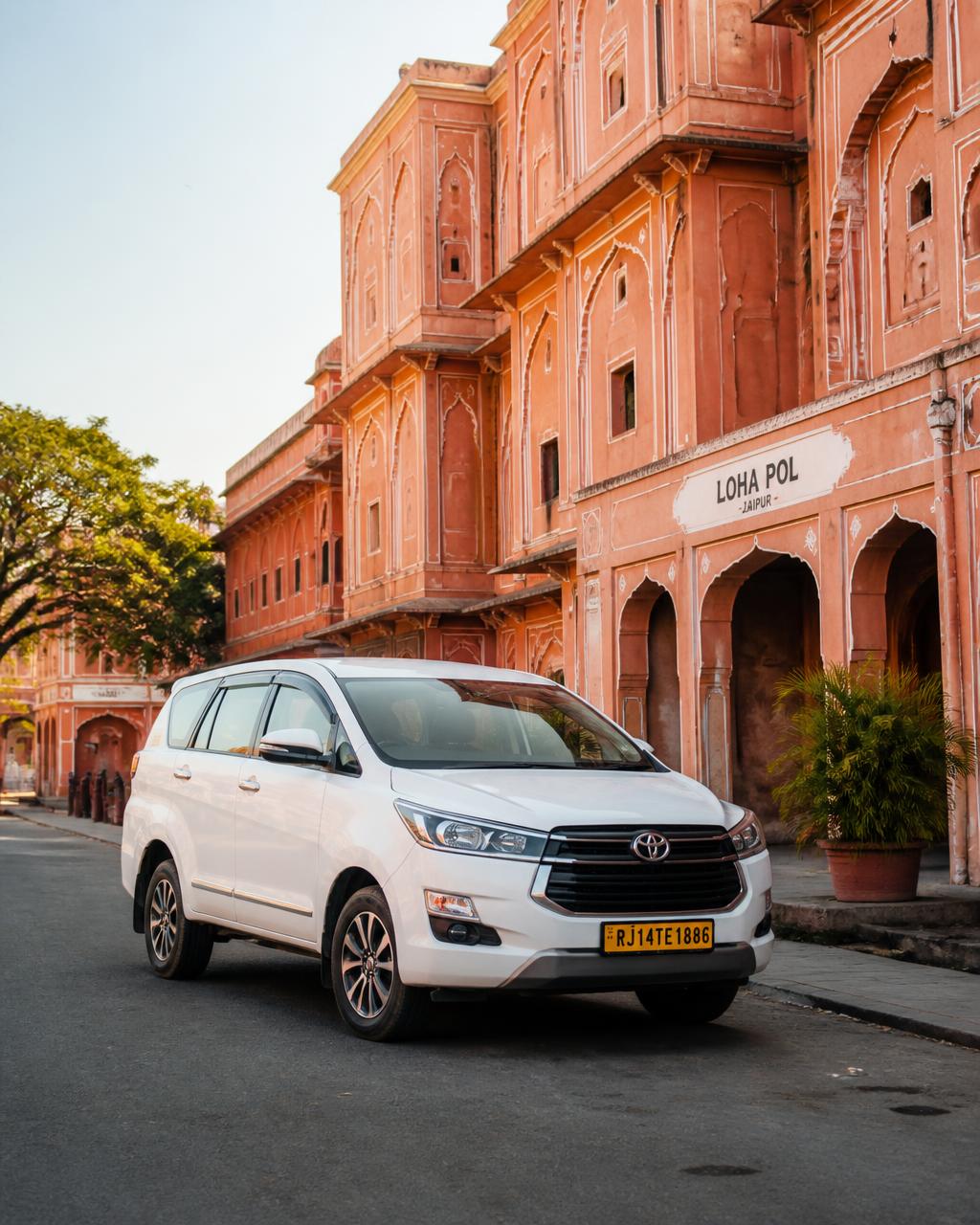 Private car parked on a quiet street in Jaipur — replace with a photo of Ravish
